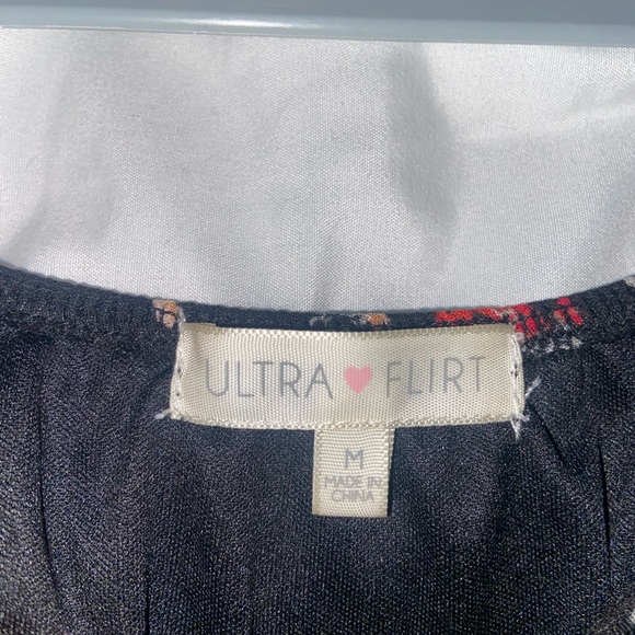 Black Mini dress with floral design. - Picture 6 of 7